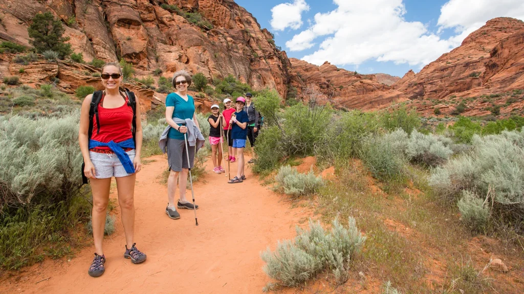 A group of people hike in Utah